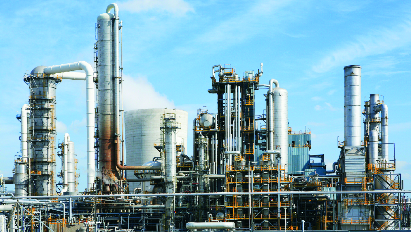 chemical-factory-equipment-skyline-during-day-with-blue-sky-horizontal-1426x807-image