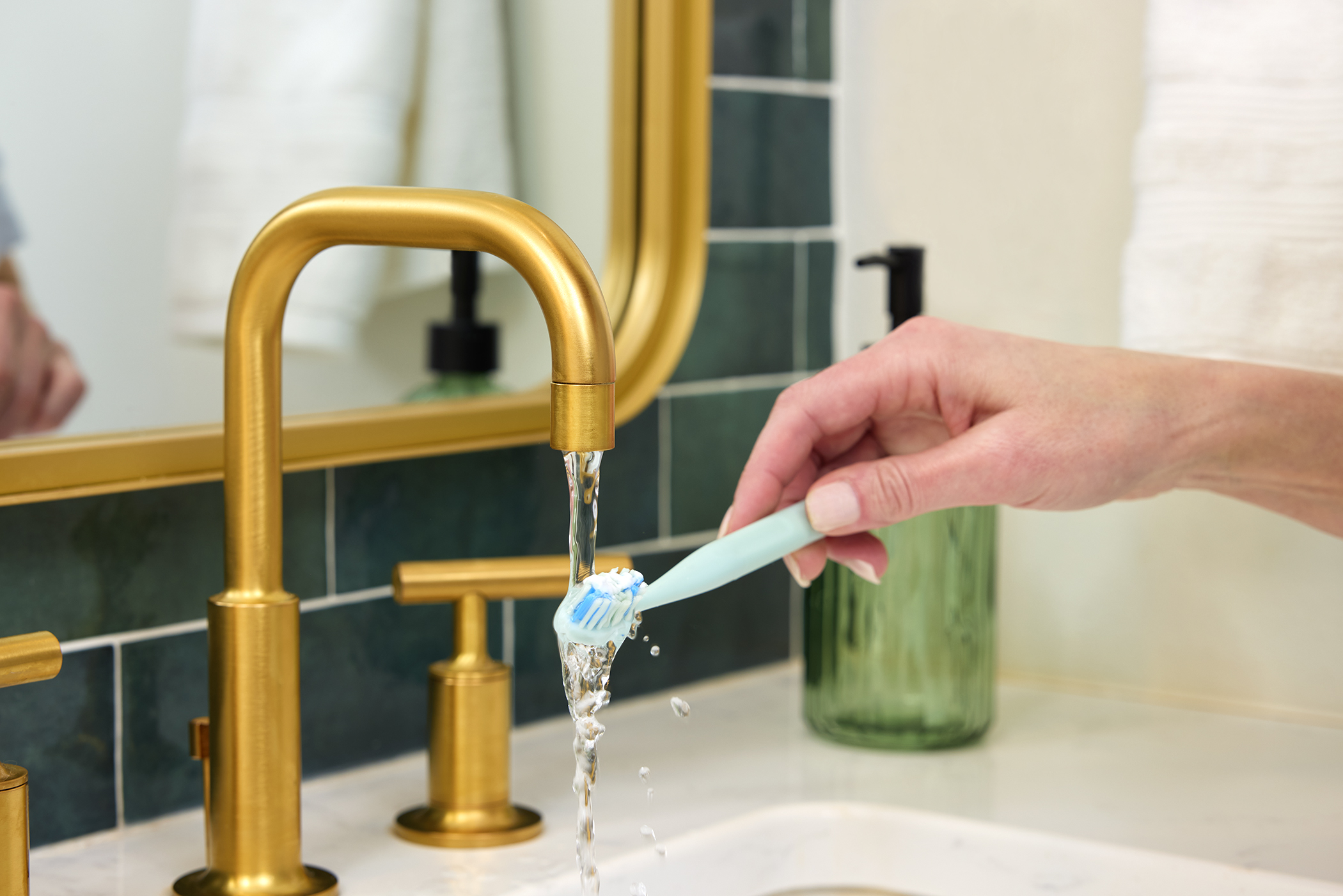 Toothbrush Under Bathroom Faucet - High End Residential Lifestyle Photoshoot