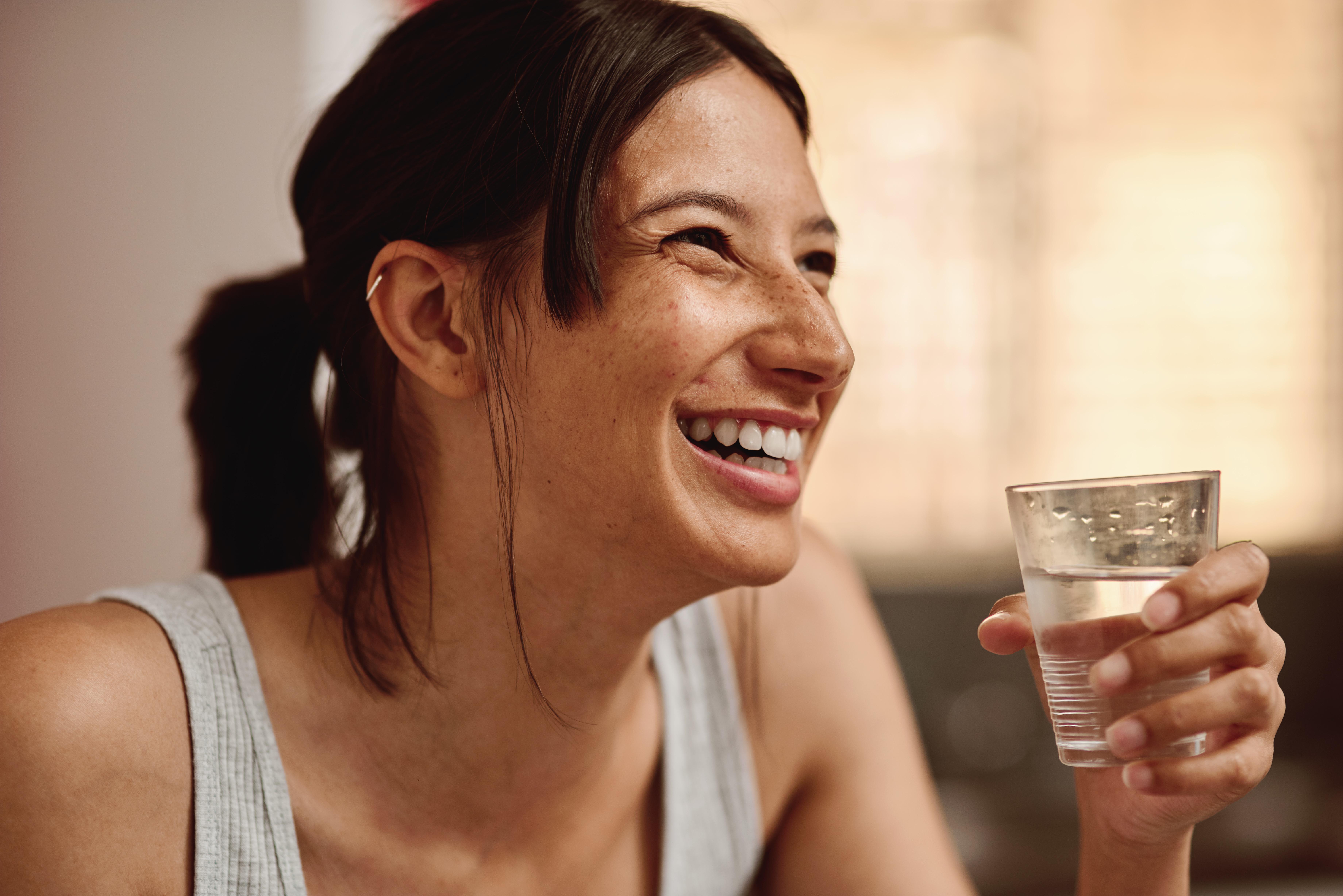 https://www.pentair.com/content/dam/extranet/global/images/stock/tier1-candid/residential/drinks/young-woman-smiling-enjoying-glass-of-water.jpg