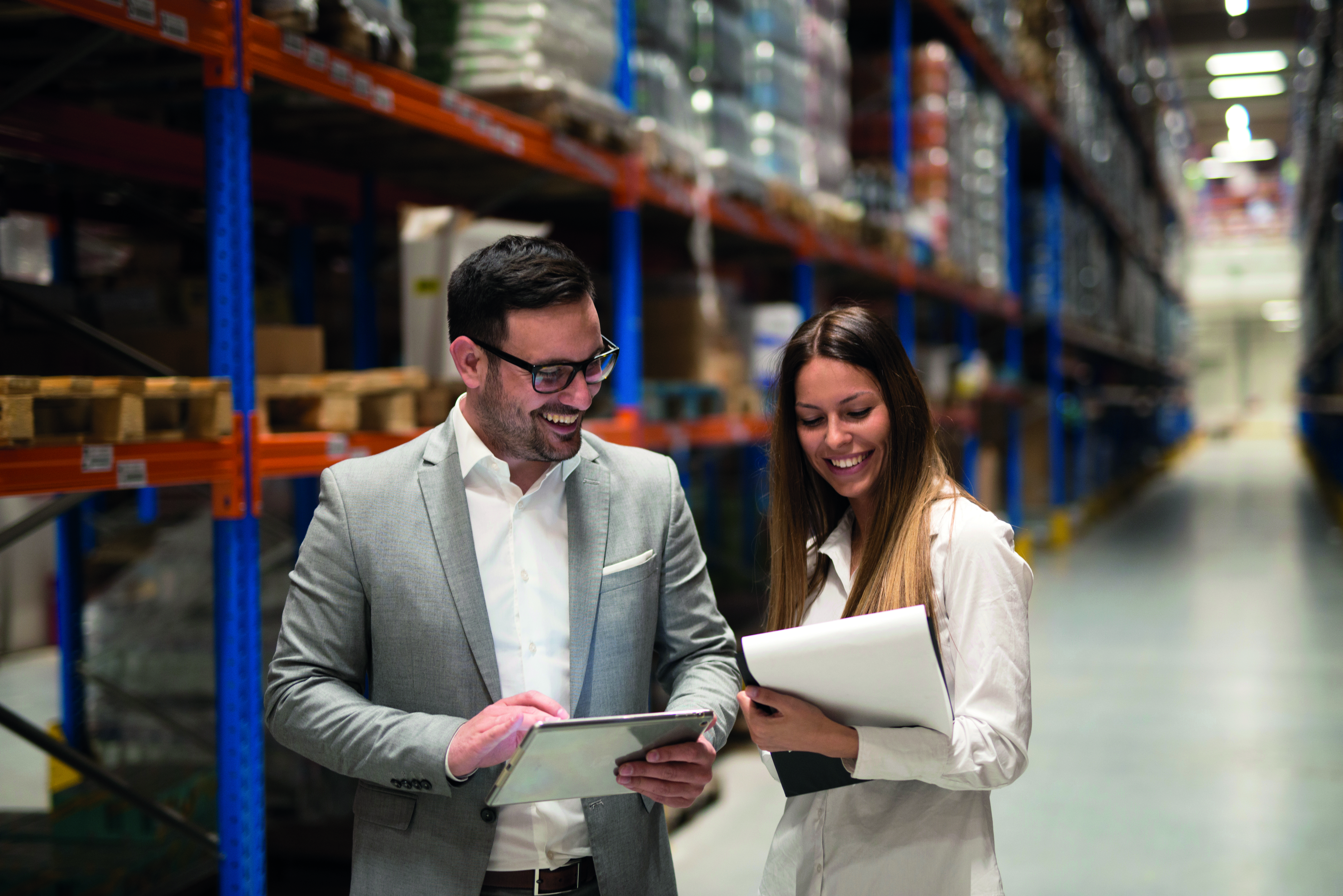 A man and Woman in a warehouse