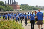 team-pentair-people-walking-by-river-on-sunny-day-outdoor-horizontal-5184x3182-image-file