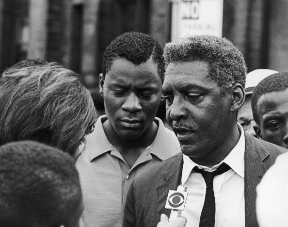 African-American civil rights activist Bayard Rustin (1912 - 1987) talks to a reporter during the Harlem Riots in Manhattan, 23rd July 1964. (Photo by Express/Hulton Archive/Getty Images)