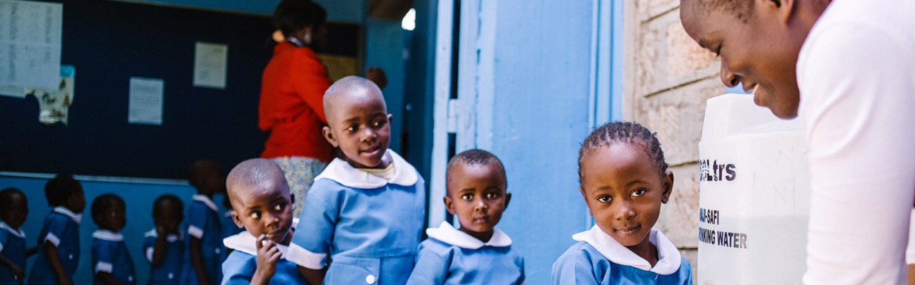 award-shofco-children-water-at-school-blue-horizontal-cropped-1440x450-image-file