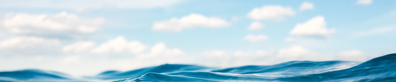 ocean-wave-blue-water-sky-horizontal-1440x300-image-file-925449974