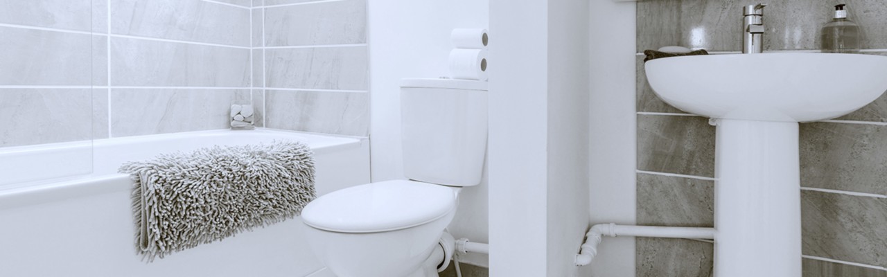 a modern bathroom in a newly converted rebuilt house