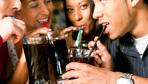 Group of friends drinking soda