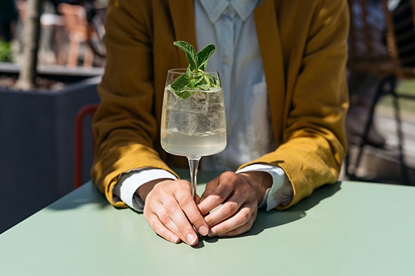 people cheers with water glasses
