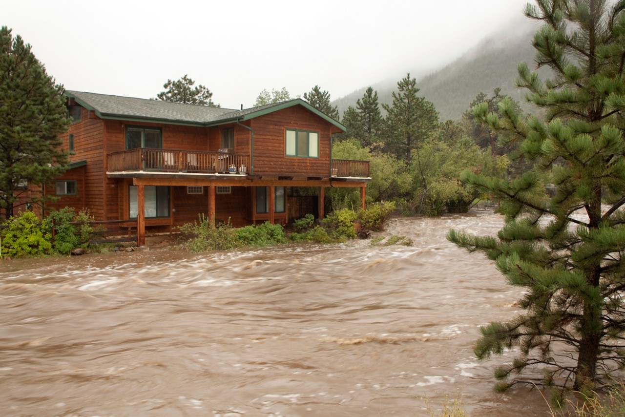 On September 12, 2013 as heavy rains fall, the back yard of a home turns into a running river in Estes Park, Colorado. After three days of solid rains, the Big Thompson River which usually just flows behind the home overflowed its banks.
