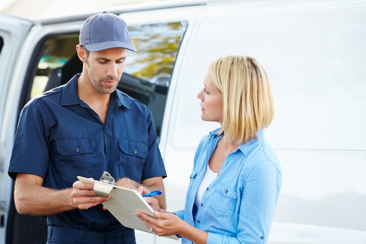 service man in blue shirt with customer discussing, water service, pool service,