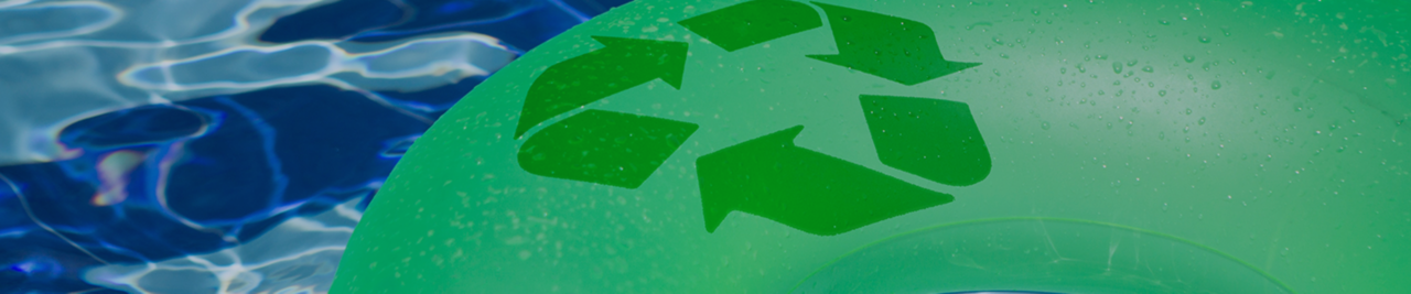 Green floaty with recycling logo in pool