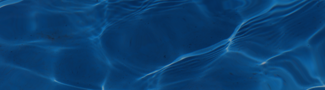 Pool water in motion with dark blue overlay