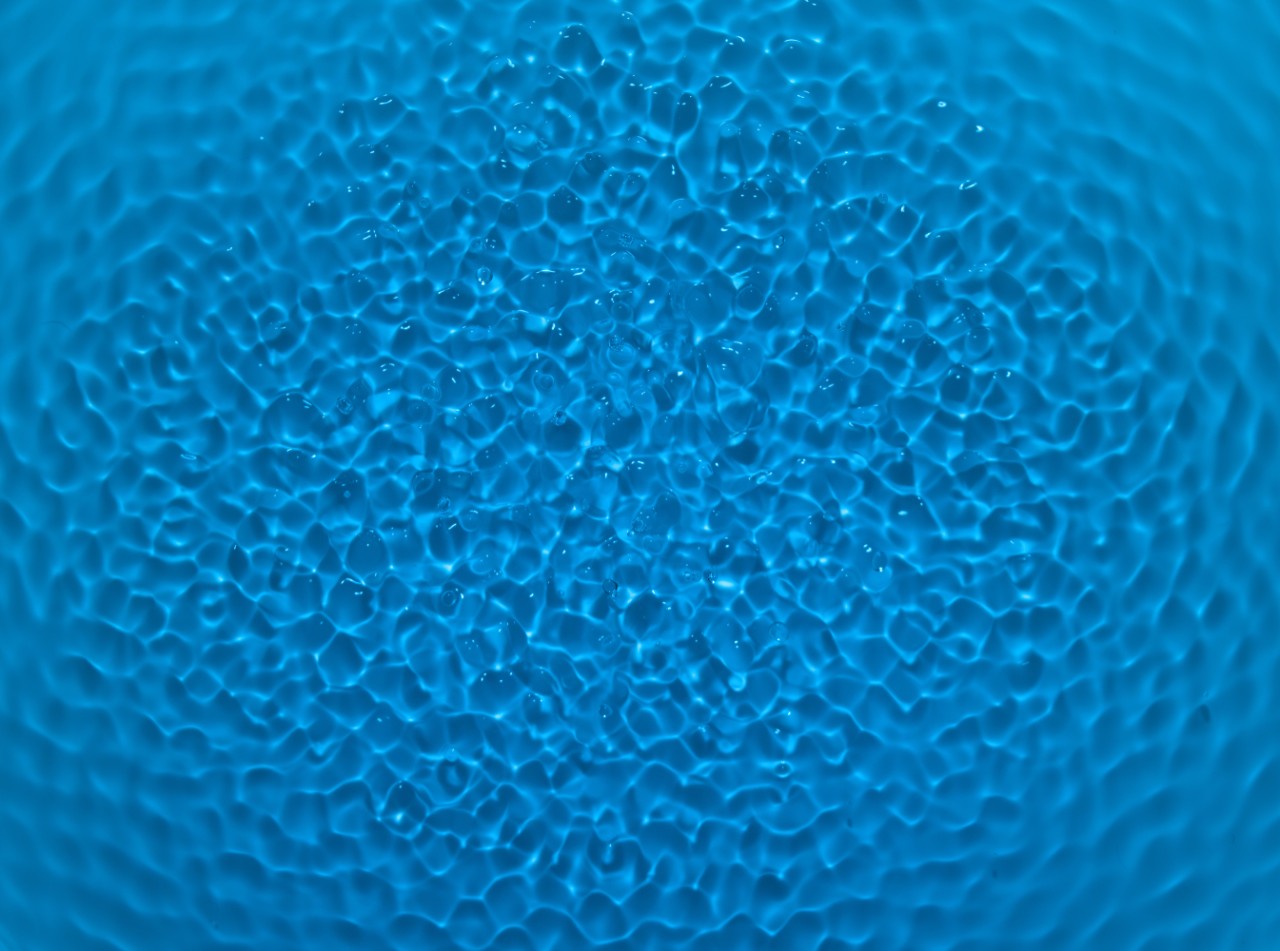 Regular water texture. The form of chladni on the water.
