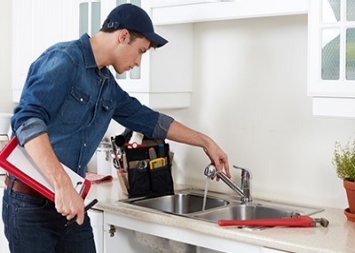 Repair man with faucet