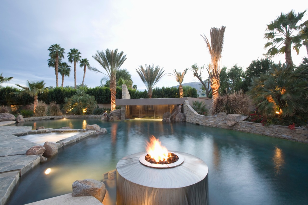 swimming pool with fire and lighting