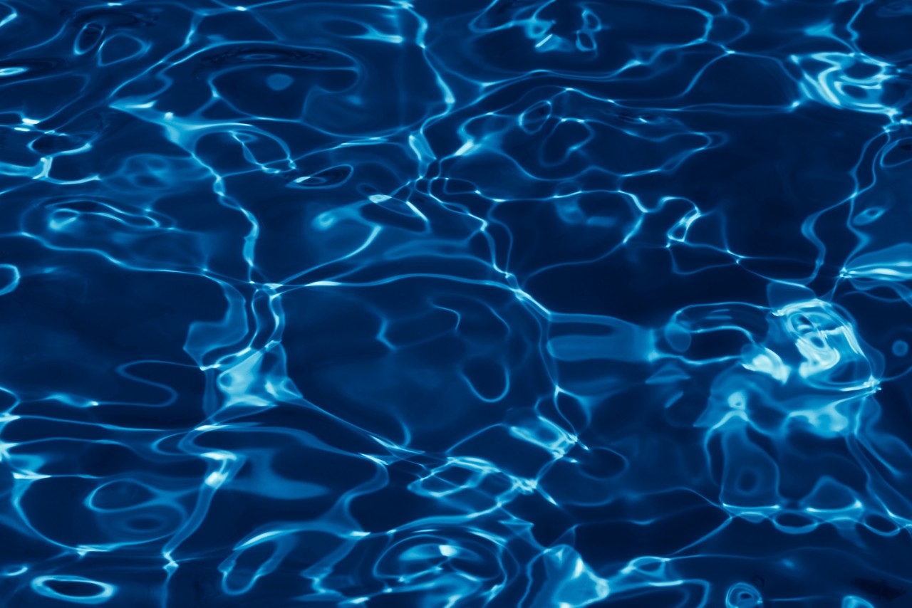 closeup of blue reflective pool water