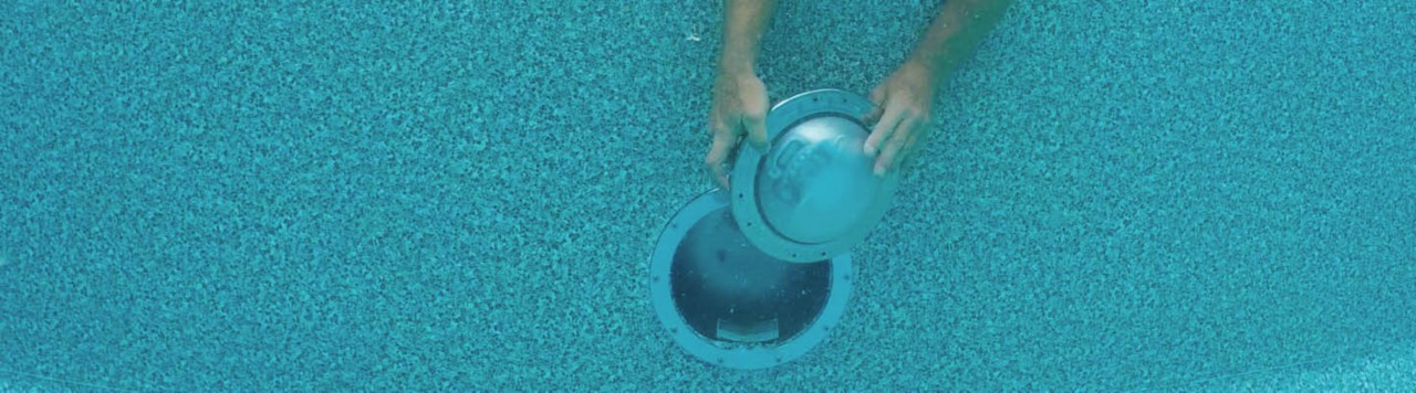 Pool servicer installing IntelliBrite Architectural Series Pool Light