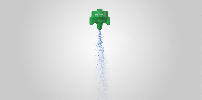 hypro, hi flow, key features green nozzle, in action with water spraying, grey background, png