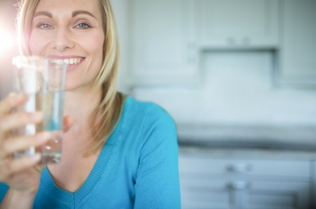 woman drinking clean water