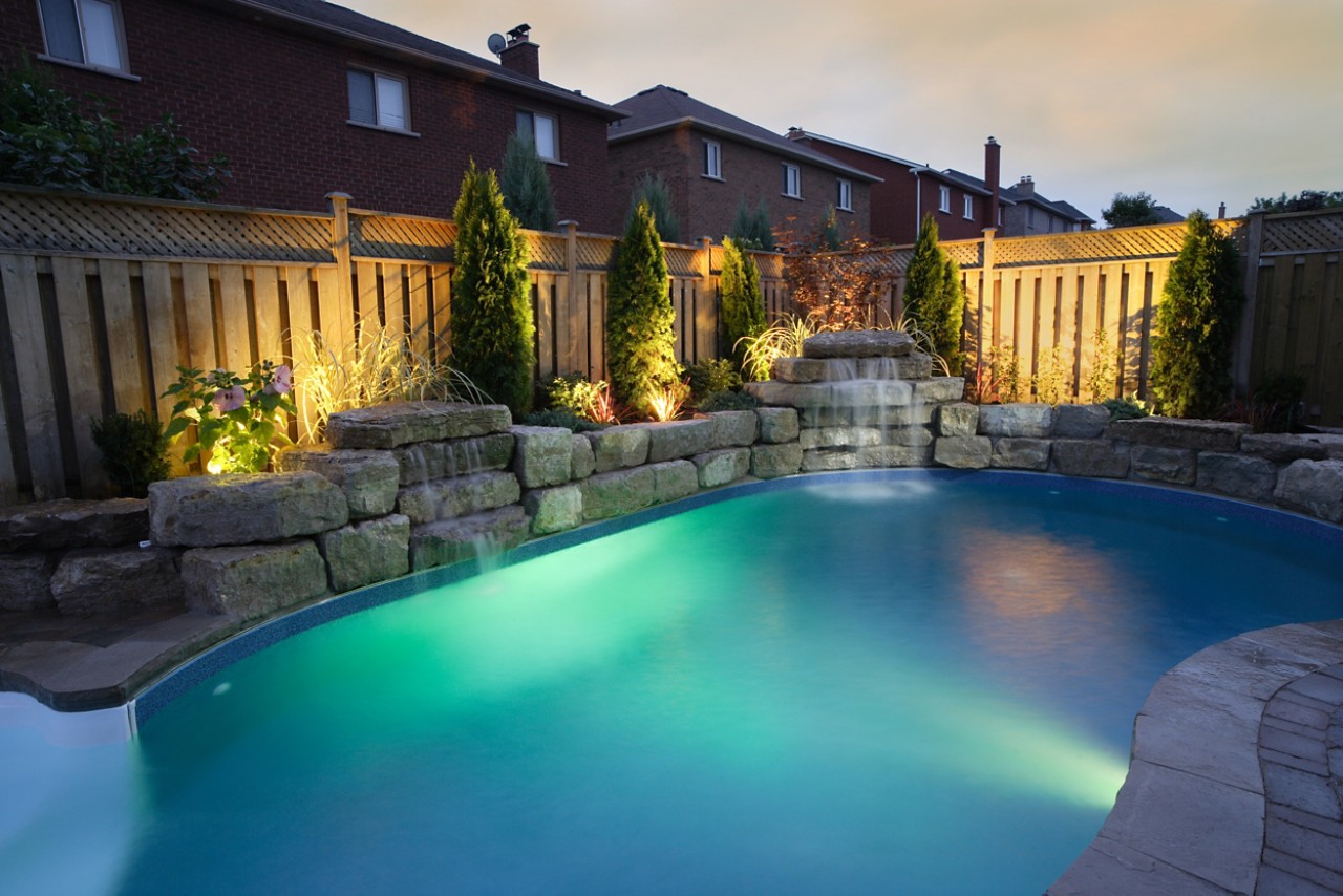 pool lit at night pool lit at night