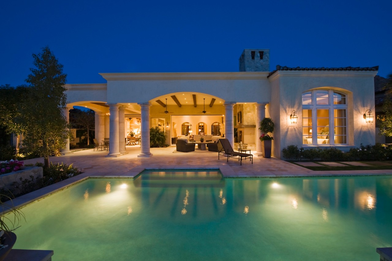 Luxury pool at mansion at night Luxury pool at mansion at night