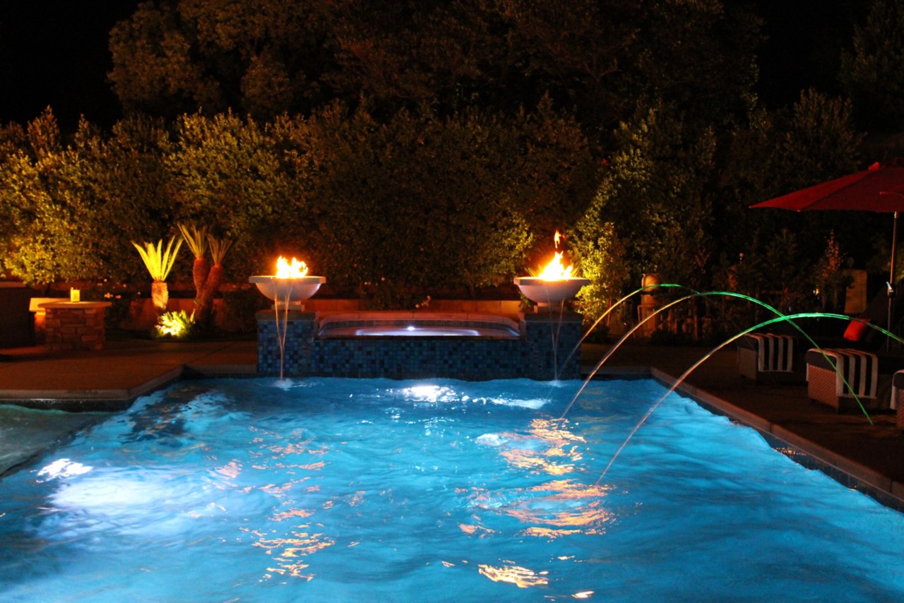 picture of pool at night with MagicFlame lit up