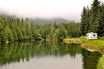 pond with passing motor home