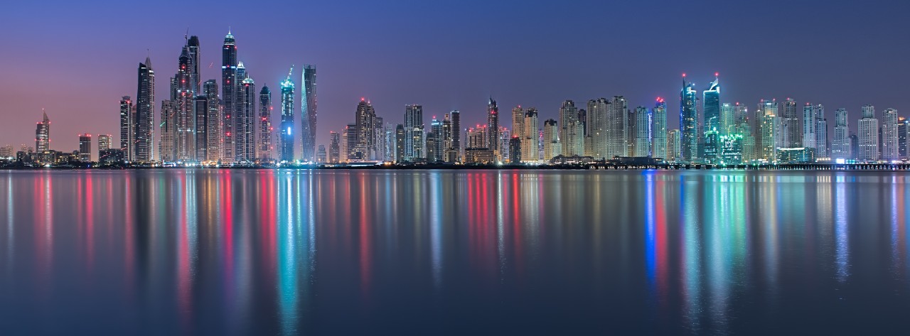 marina-city-skyline-panoramic-at-night-with-tall-buildings-and-colorful-lights-horizontal-7745x2867-image-file