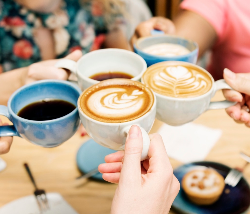 Friends having coffee together