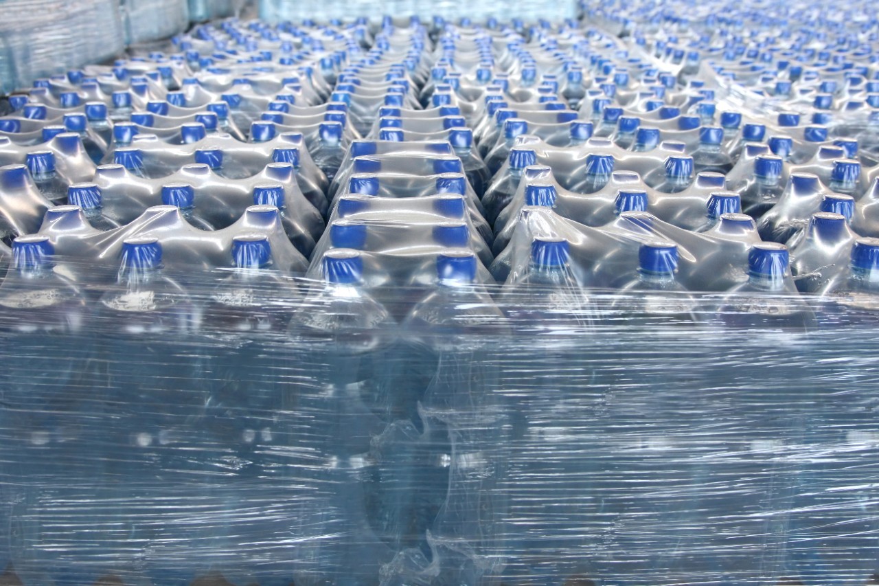 Detail of stack bottled water in industry