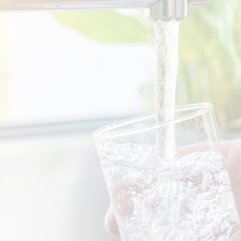 filling water under faucet