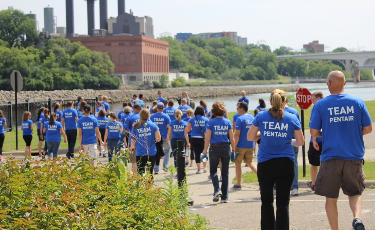 Hero Image team-pentair-people-walking-by-river-on-sunny-day-outdoor-horizontal-5184x3182-image-file